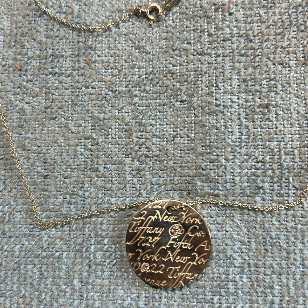 Tiffany & Co 5 th Ave Notes + 2 Diamonds , .05cts equals .10 cts